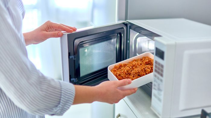 How much radiation does a microwave emit